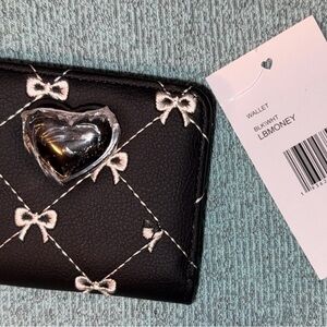 Betsey Johnson Black Quilted Bow-Embroidered Wallet with Heart Accent